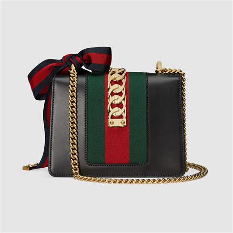 gucci small chain purse|Gucci clutch bag with chain.